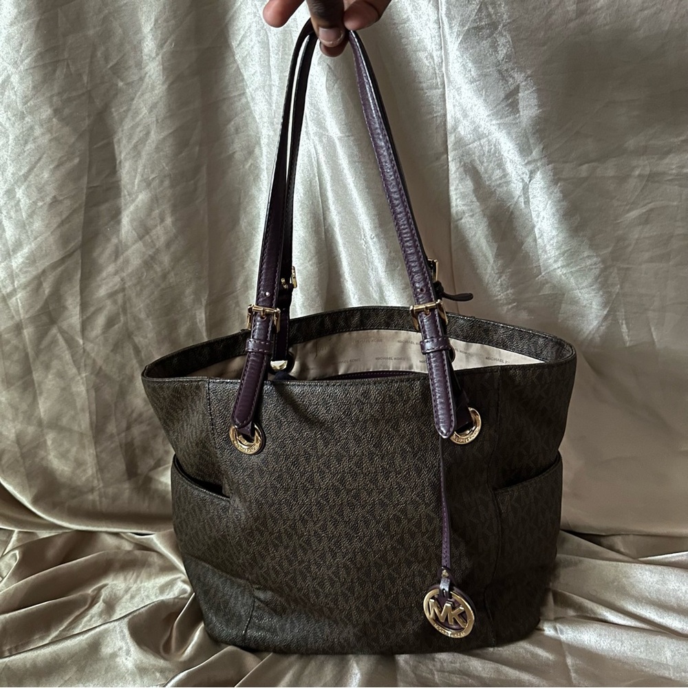 Michael Kors monogram canvas leather tote bag with purple straps